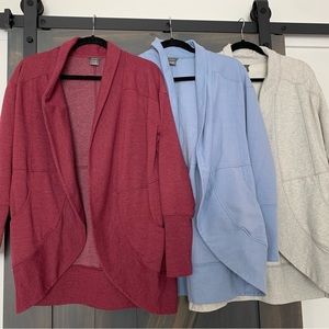3 identical cardigans